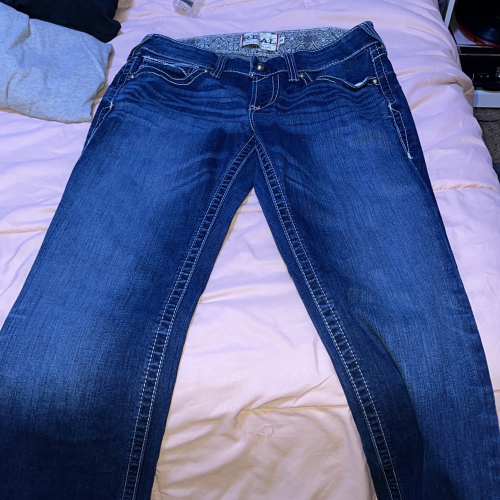 Size 30, ariat dark blue jeans.